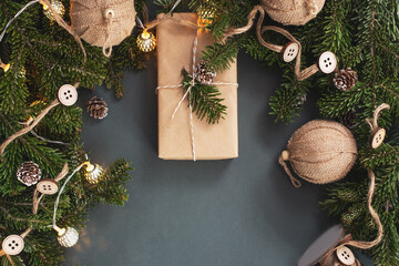 Christmas or New Year dark wooden background, Xmas black board framed with season decorations, space for a text, view from above