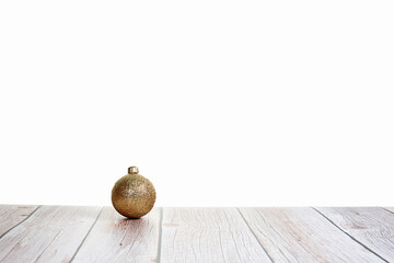 Christmas ball on white background on wooden table.