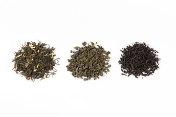 dry black tea,scented tea and green tea leaf isolated on white background