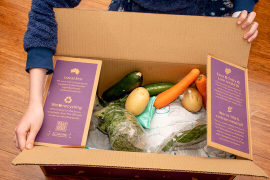 Sydney, Australia 2021-08-04 Open Dinnery cardbord box with meal kits. Australian subscription delivery meal kit service.