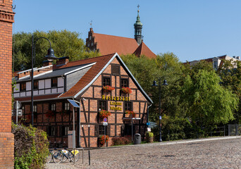 view of the historic Karzma Mlynska restaurant on Mill Island in the historic city center of Bygdoszcz