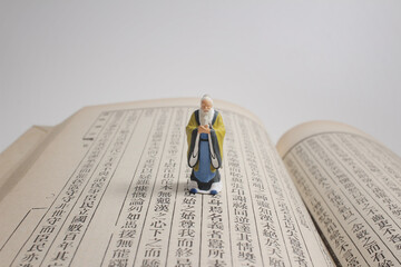 a figure old man stand on the chinese calligraphy book
