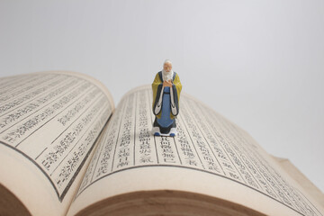 a figure old man stand on the chinese calligraphy book