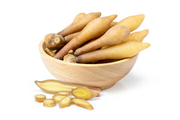 Finger root in wooden bowl isolated on white background