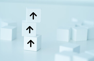 Arrow pointing up on white cube