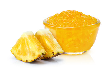 Pineapple jam in glass bowl and fresh pineapple fruit isolated on white background. 