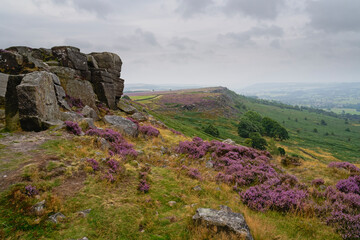 From Curbar Edge over to Baslow Edge in the Derbyshire Peak District on a grey damp summer morning.