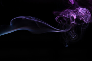 Abstract colored smoke hookah on dark background. Texture. Art Design element. Personal vaporizers fragrant steam. Concept of alternative non-nicotine smoking. E-cigarette. Evaporator.