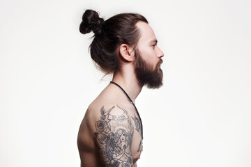 Handsome Bearded Man with long hair and tattoo