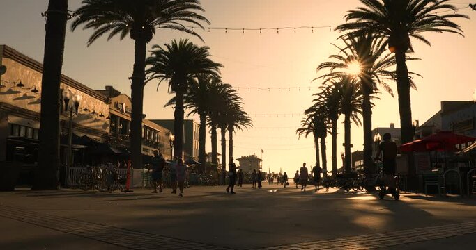 Pier Avenue at the Hermosa Beach Pier in California during a golden sunset