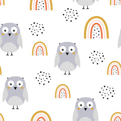seamless pattern with cute owl and rainbows