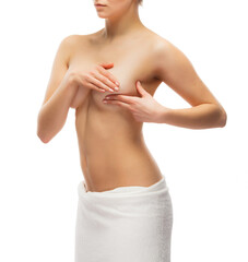 Fototapeta premium Woman examining breast isolated on white background 