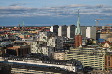 View of the center of Stockholm from above with the mix of old and new buildings , cathedrals and Central railway station in the front