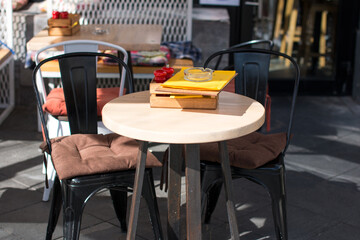 outdoor tables in cafes. Summer veranda of the restaurant