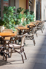 Fototapeta na wymiar outdoor tables in cafes. Summer veranda of the restaurant