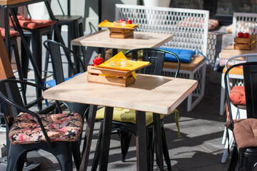 outdoor tables in cafes. Summer veranda of the restaurant