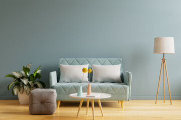 Interior mockup with sofa in living room with empty blue wall background.