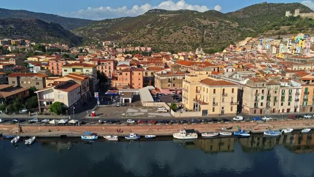 A beautiful view of ships on a canal in Bosa, Sardinia