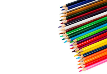 Fototapeta premium Colorful. watercolor pencils on white background copy space