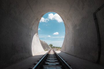 railway in the tunnel with blue sky 