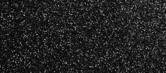 Black glitter texture abstract background banner. Sandpapper close-up, macro photo