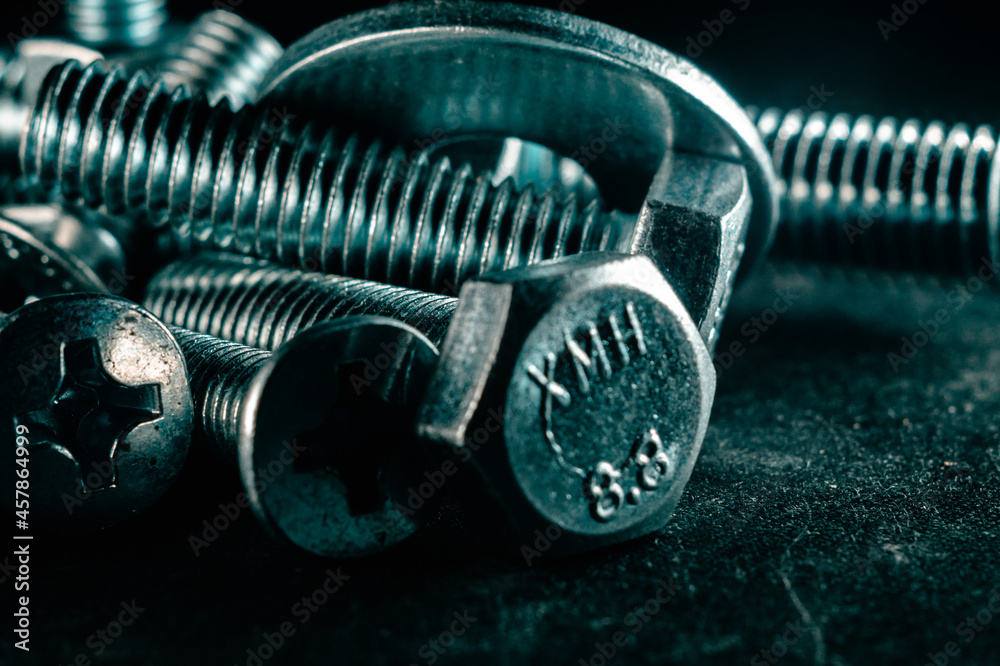 Wall mural Pile of old metal bolts and screws