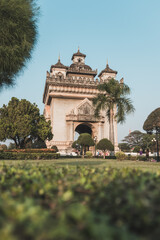 Temple in Vientiane in Laos. Scenic view of a park with a temple in Laos. High quality photo