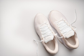 Flat lay sport with white sport shoes on white background. Concept healthy lifestyle, sport and diet