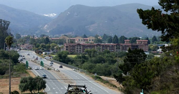 Traffic passes by the downtown area of Lompoc, California, USA.
