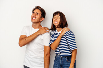 Naklejka premium Young mixed race couple isolated on white background having a shoulder pain.