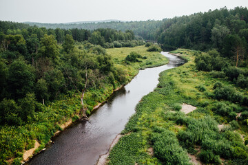 Beautiful natural landscape with a flowing river in the Olenyi Streams park in the Sverdlovsk region