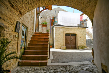 Naklejka premium A narrow street in Ascoli Satriano, an old town in the province of Foggia, Italy.