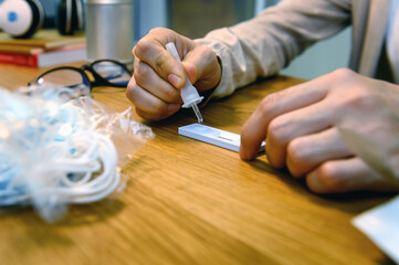 Using antigen diagnostic test device