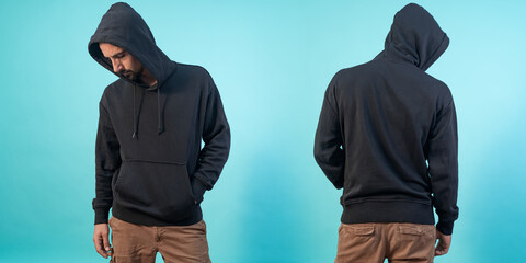 Front and back view of a black hoodie mockup for design print on blue background.
