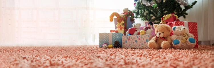 Banner Christmas present gift box under bauble christmas tree decorated holiday winter xmas. Panorama Present gift boxes to family kids decor in cozy living room copy space. Merry xmas happy new year