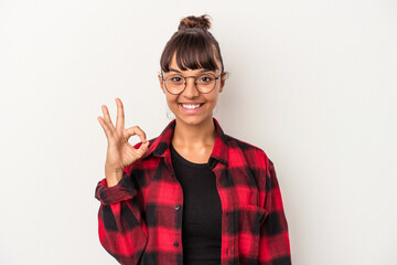 Young mixed race woman isolated on white background  cheerful and confident showing ok gesture.