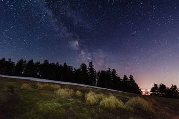 Bright starry sky with the milky way on the background of High Tatras mountains