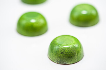 Chocolate candies, sweet food background.