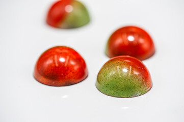 Chocolate candies, sweet food background.