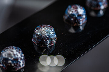 Chocolate candies, sweet food background.