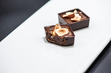 Chocolate candies, sweet food background.