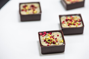 Chocolate candies, sweet food background.