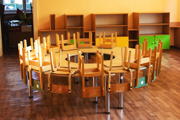 Chairs and round table in the kindergarten room