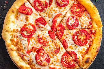 pizza margarita tomato, cheese, mozzarella, tomato sauce, dough Italian food fresh vegetarian food fast food ready to eat meal snack on the table copy space food background 