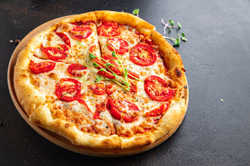pizza margarita tomato, cheese, mozzarella, tomato sauce, dough Italian food fresh vegetarian food fast food ready to eat meal snack on the table copy space food background 