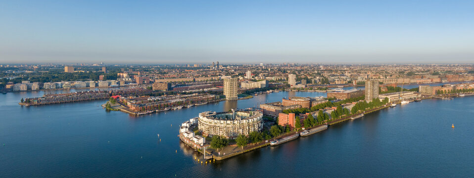 Aerial panorama of Eastern Docklands residential area in Amsterdam