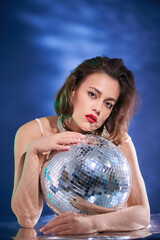 party girl with a disco ball