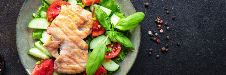 salad chicken breast meat vegetable tomato, cucumber, lettuce diet food meal snack on the table copy space food background keto or paleo diet veggie