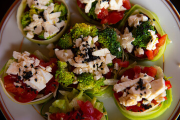 Vegetables Arranged As Circles On A White Plate With A Gold Rim, The Centre One In Focus