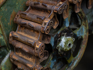 Rusty massive metal tank tracks